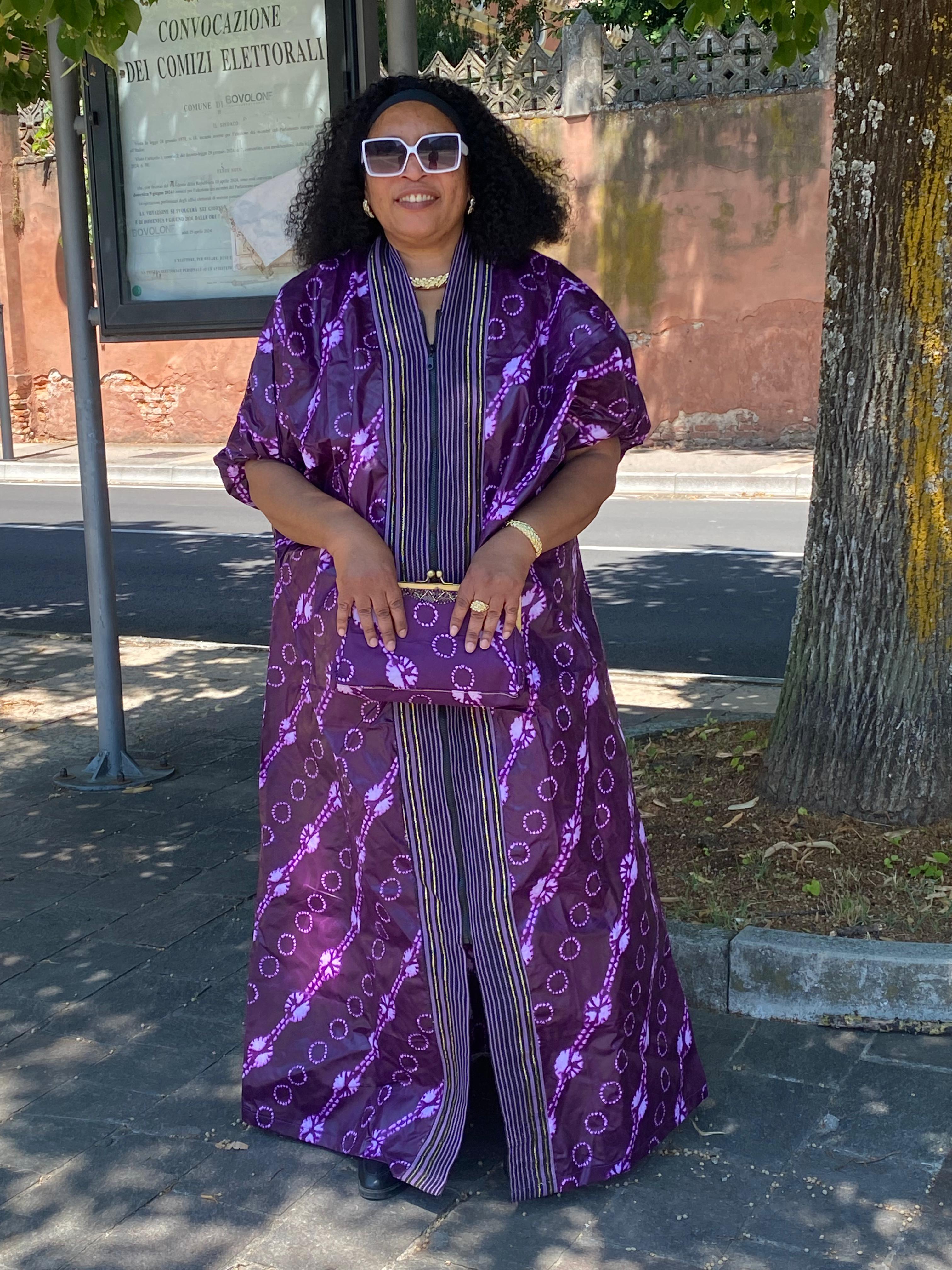 Purple, black and white Adire bubu gown designed with ashoke plus the purse